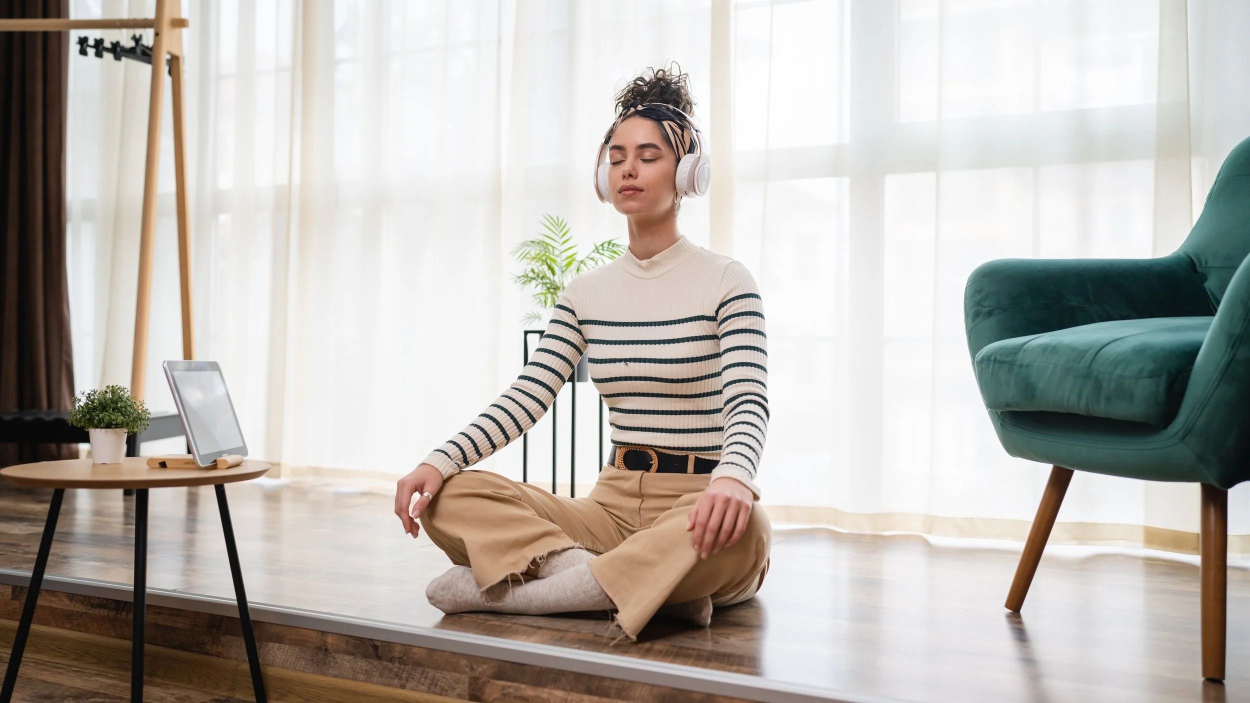 woman sitting and meditating
